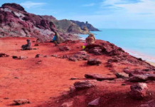 Near The Strait Of Hormuz, This Island’s Crimson Beach Looks Almost Unreal